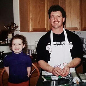 Sara making dinner with her dad